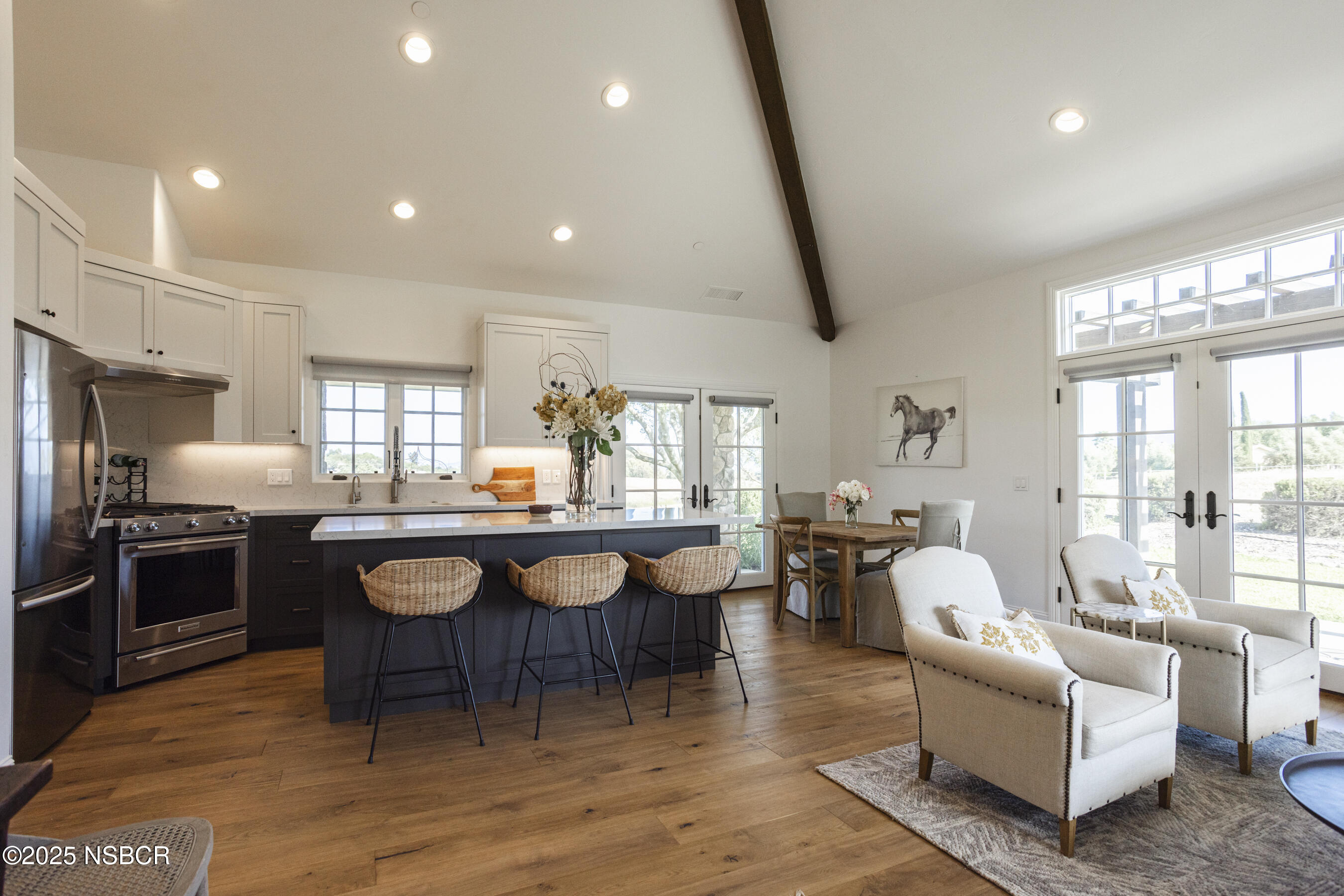 1740 Still Meadow Road Solvang, CA 93463 - Photo 17 of 43 a dining room with furniture and wooden floor