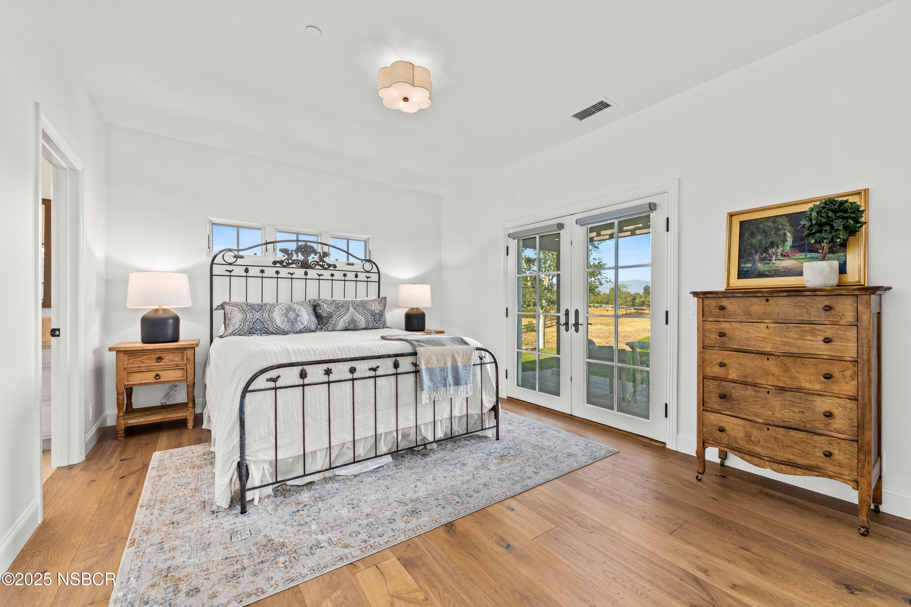 1740 Still Meadow Road Solvang, CA 93463 - Photo 24 of 43 a bedroom with a bed and a window