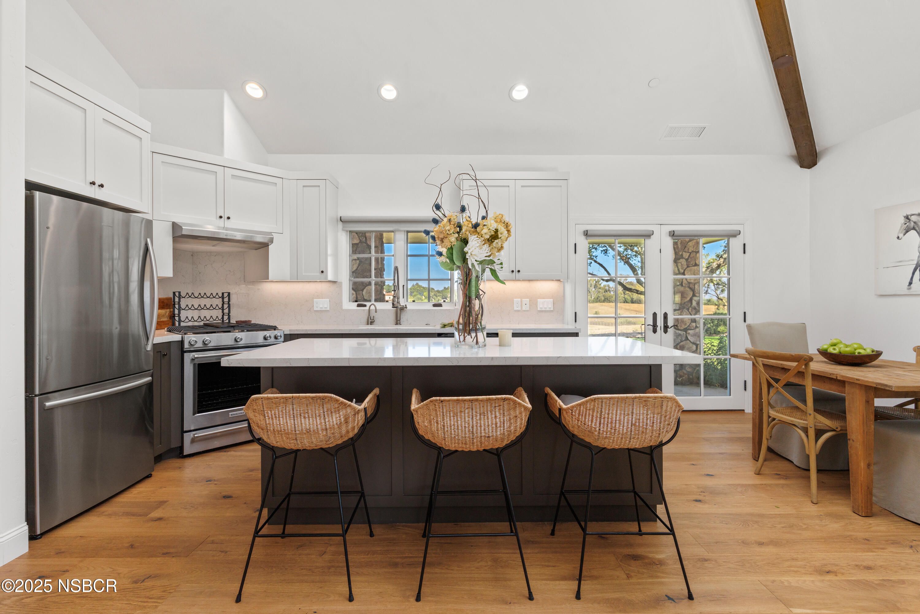 1740 Still Meadow Road Solvang, CA 93463 - Photo 9 of 43 a kitchen with stainless steel appliances granite countertop a sink and a refrigerator