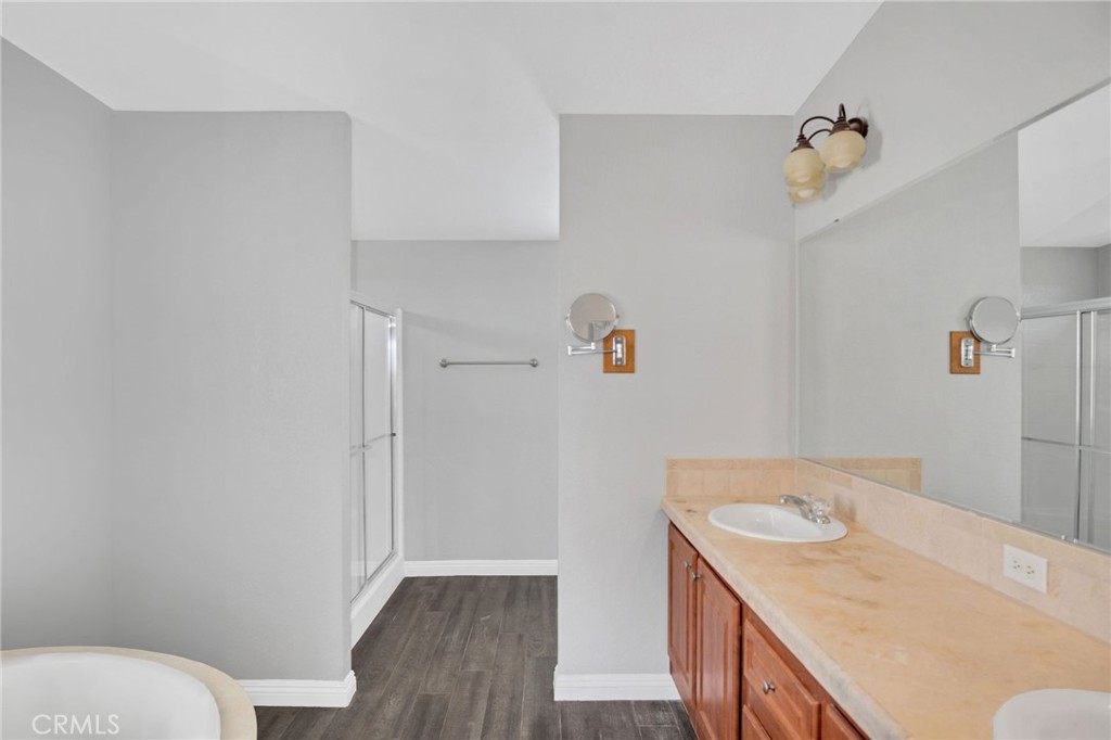 35380 Cheseboro Road Palmdale, CA 93552 - Photo 14 of 42 a utility room with a wooden floor
