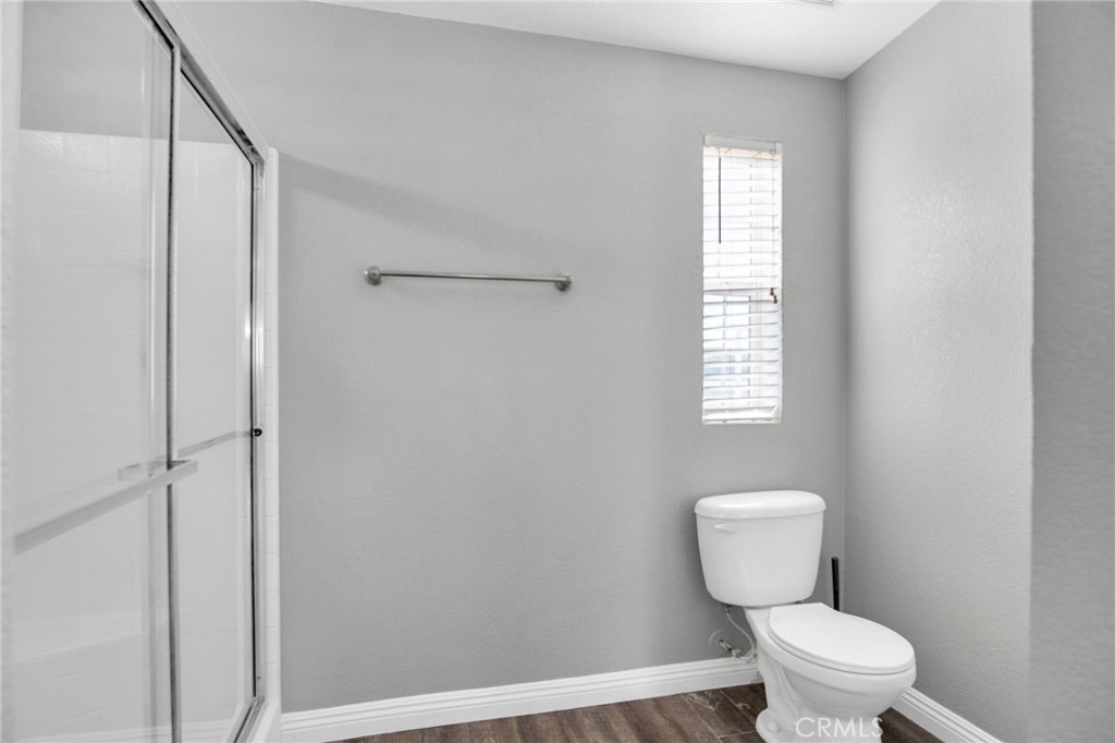35380 Cheseboro Road Palmdale, CA 93552 - Photo 16 of 42 a a bathroom with a toilet and a shower