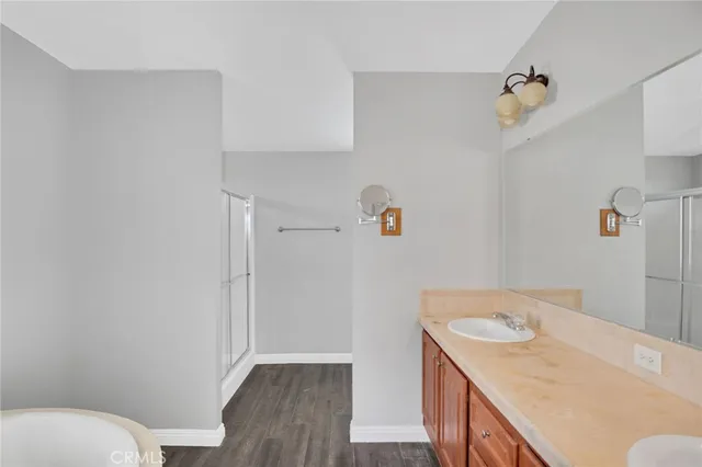 a utility room with a wooden floor