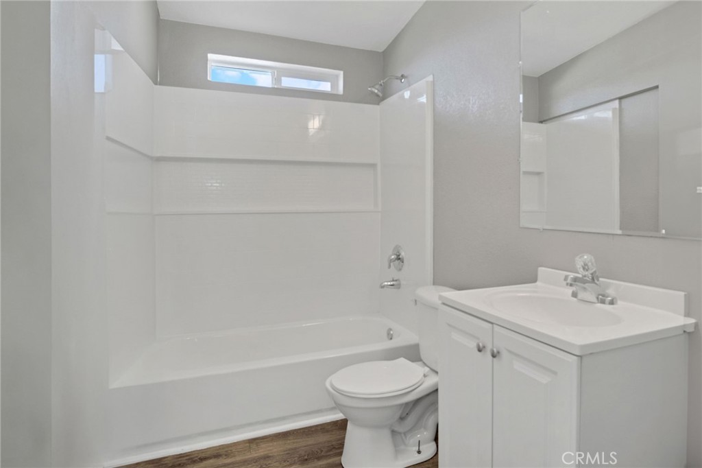 35380 Cheseboro Road Palmdale, CA 93552 - Photo 25 of 42 a bathroom with a sink a toilet and shower