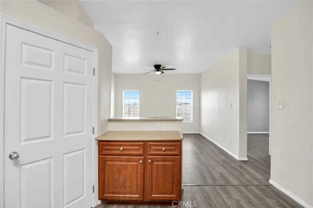 an entryway with wooden floor