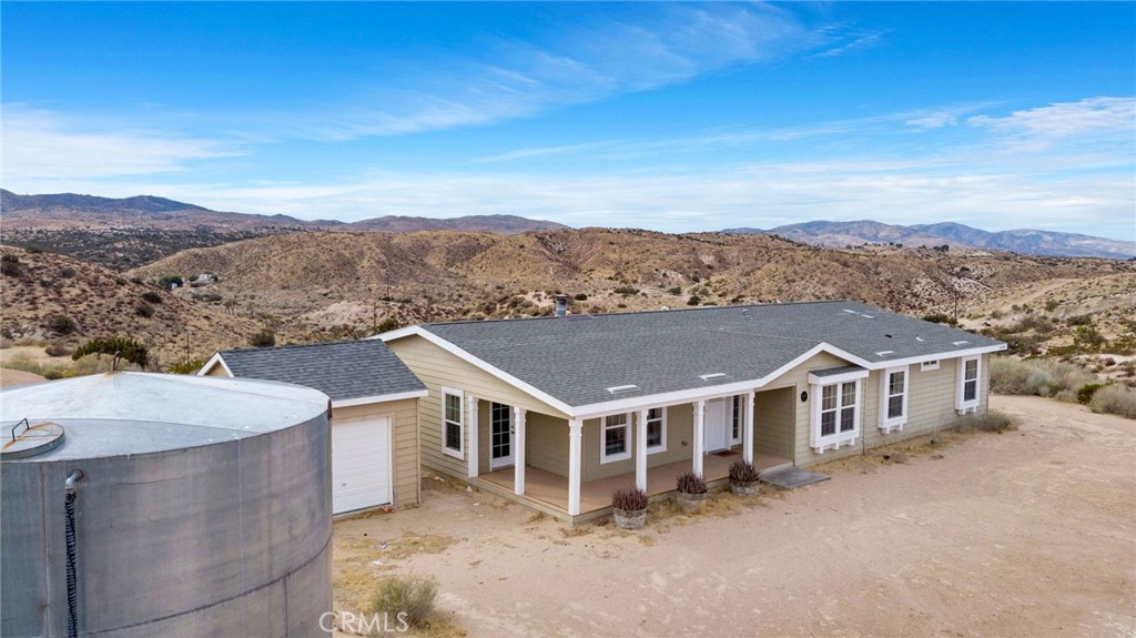 35380 Cheseboro Road Palmdale, CA 93552 - Photo 30 of 42 an aerial view of residential houses with a city view