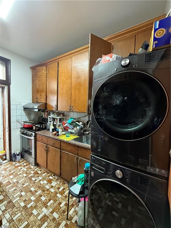 436 77th Street Brooklyn, NY 11209 - Photo 6 of 7 a utility room with sink dryer and washer