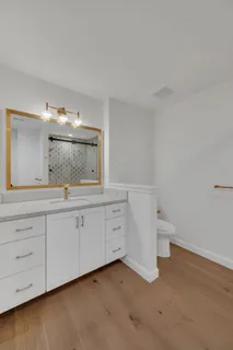 a bathroom with a bathtub and a shower