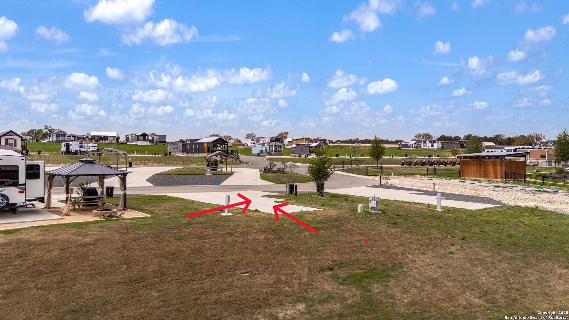 5386 Ranch Road 1376, Unit 101 Fredericksburg, TX 78624 - Photo 5 of 27 a view of a lake with houses