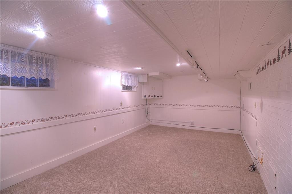 137 Briercliff Road Beaver Falls, PA 15010 - Photo 13 of 25 Get away to the lower level Game Room featuring newer carepting and ample lighting. Perfect place to enjoy your favorite games, sports or just relax!