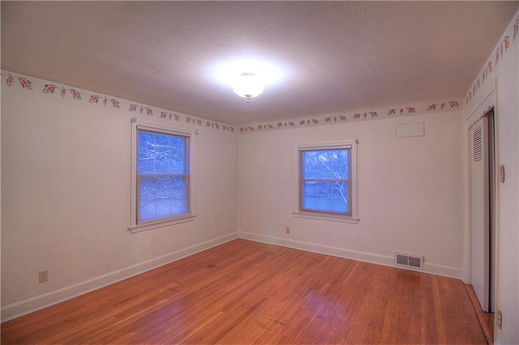 137 Briercliff Road Beaver Falls, PA 15010 - Photo 19 of 25 The second bedroom also offers hardwood floors and a double closet, looking to the front and side of the home.