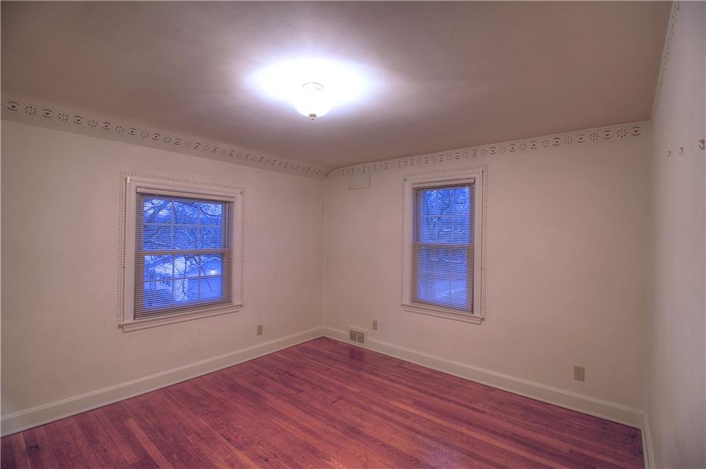 137 Briercliff Road Beaver Falls, PA 15010 - Photo 21 of 25 The 3rd Bedroom is ample and finshed with an elegant, neutral palette.