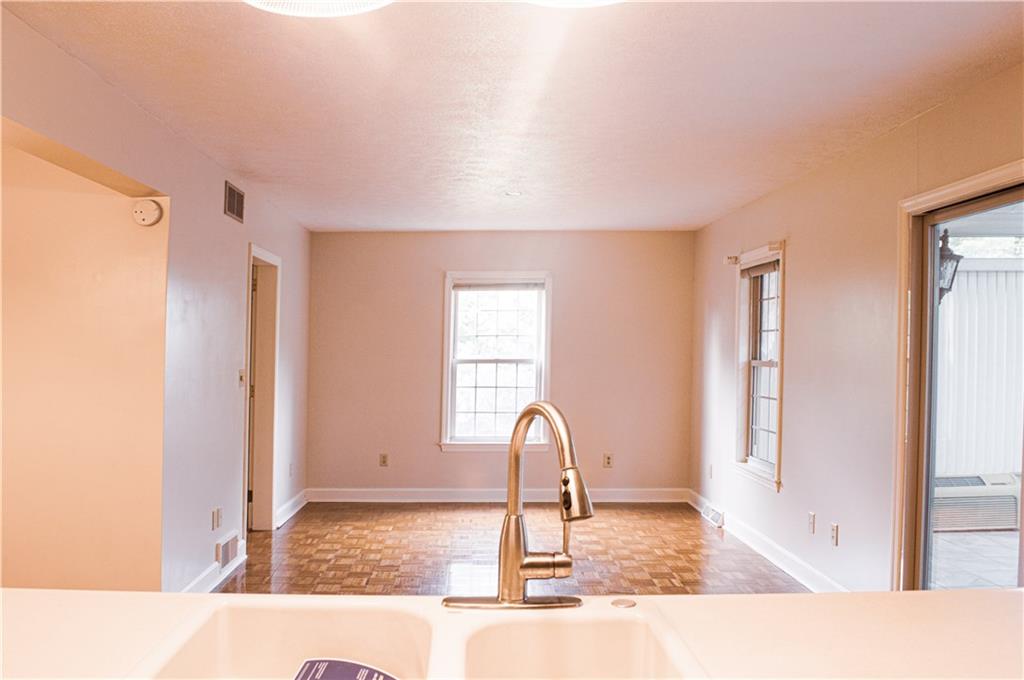 137 Briercliff Road Beaver Falls, PA 15010 - Photo 22 of 25 Family Room grabs natural light from all angles. The Sun Room is to your right. (Images are larger than they appear)