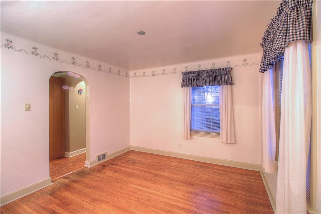 137 Briercliff Road Beaver Falls, PA 15010 - Photo 10 of 25 The Dining Room features hardwood flooring, arched doorways and ample natural light.