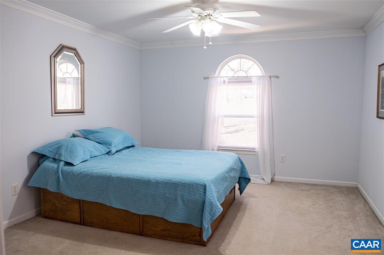 29 East Point Road Palmyra, VA 22963 - Photo 17 of 33 a bedroom with a bed and a window