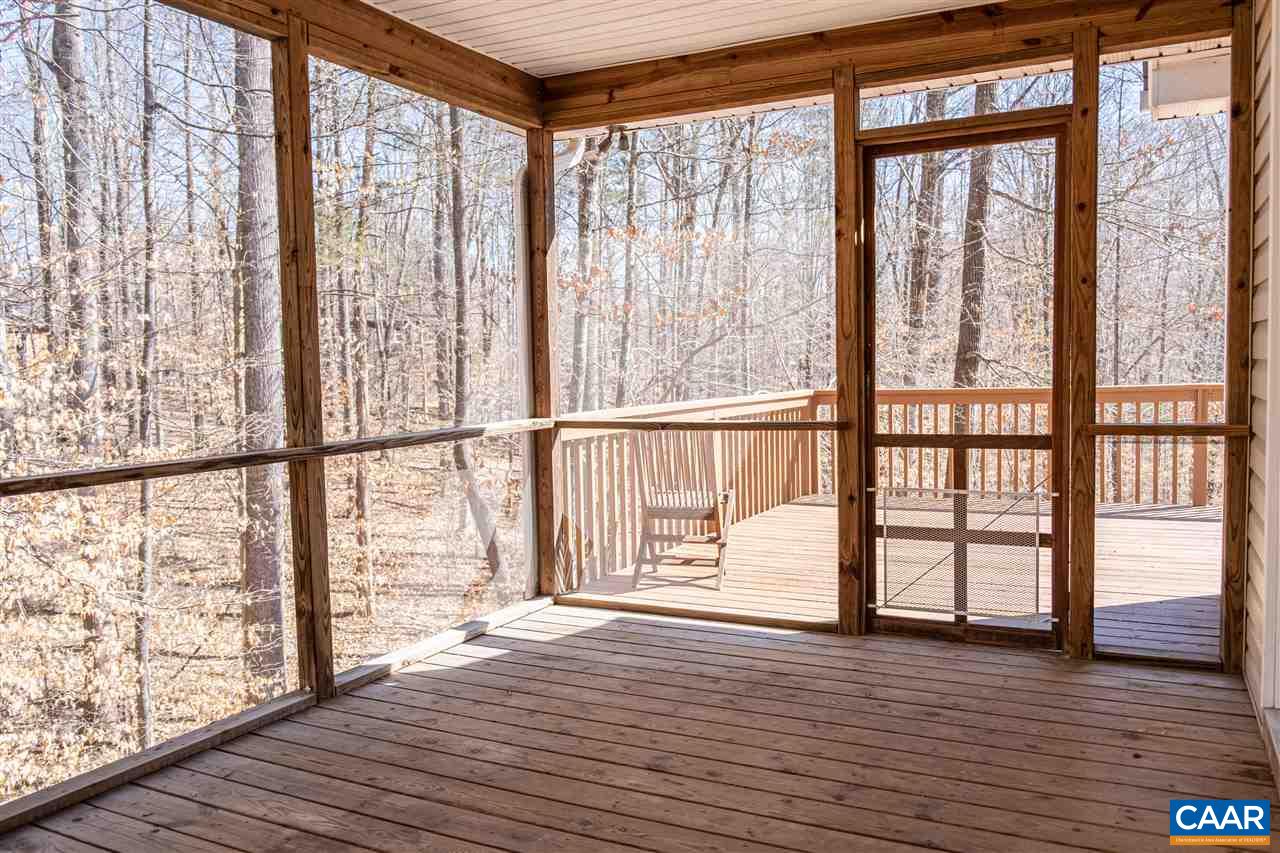 29 East Point Road Palmyra, VA 22963 - Photo 2 of 33 a view of an empty room with wooden floor and a window
