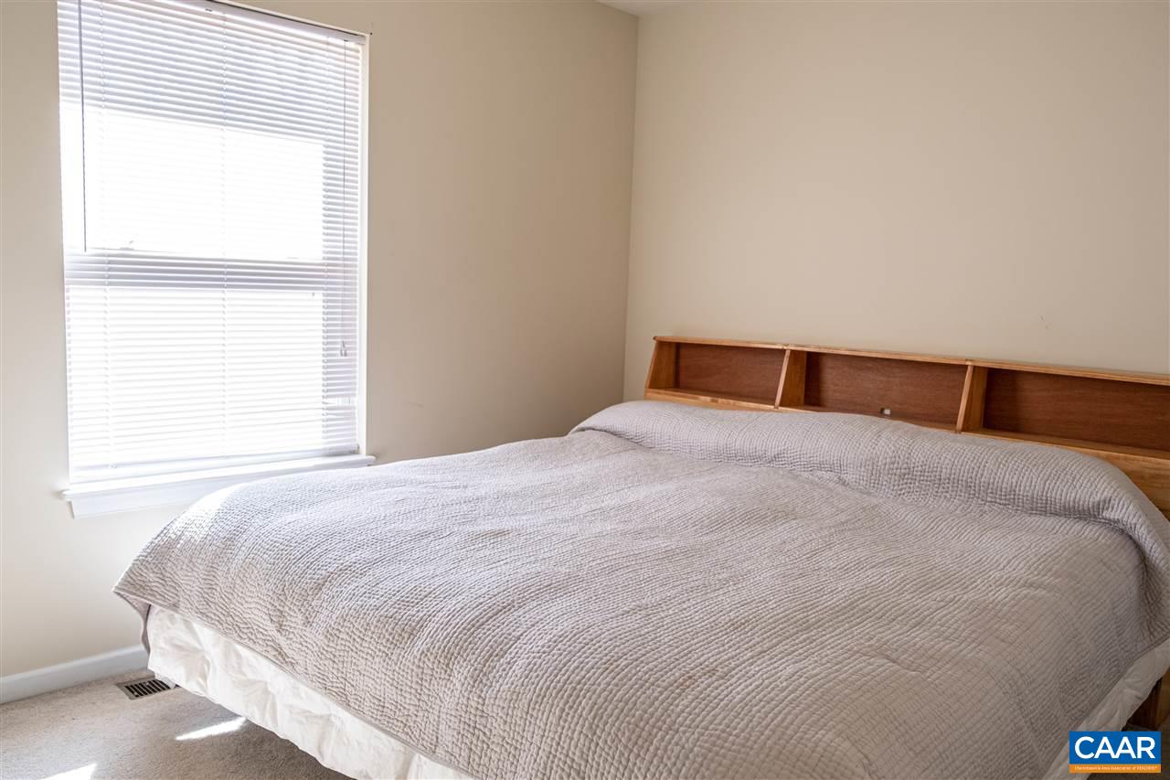 29 East Point Road Palmyra, VA 22963 - Photo 21 of 33 a bedroom with a bed and a window