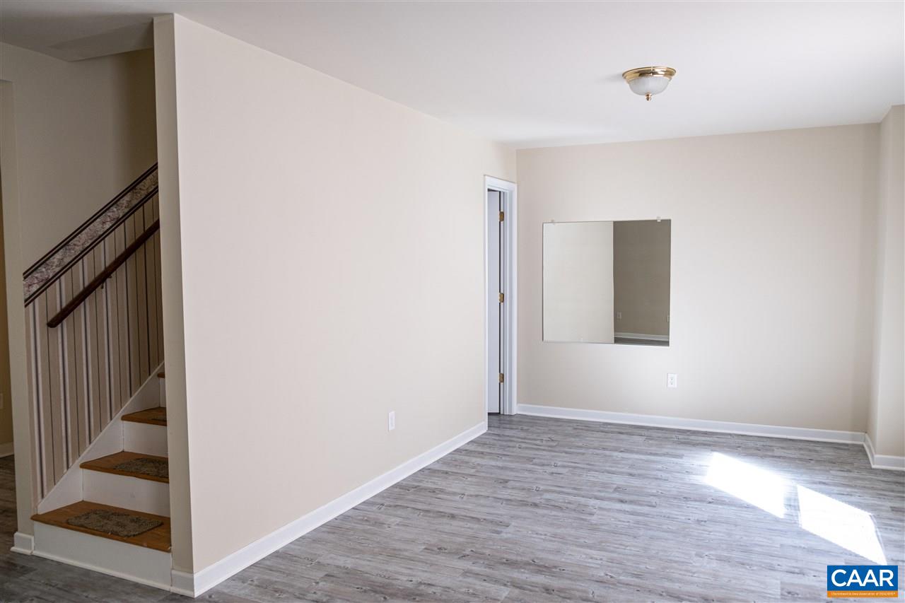 29 East Point Road Palmyra, VA 22963 - Photo 24 of 33 a view of an empty room with wooden floor and entryway