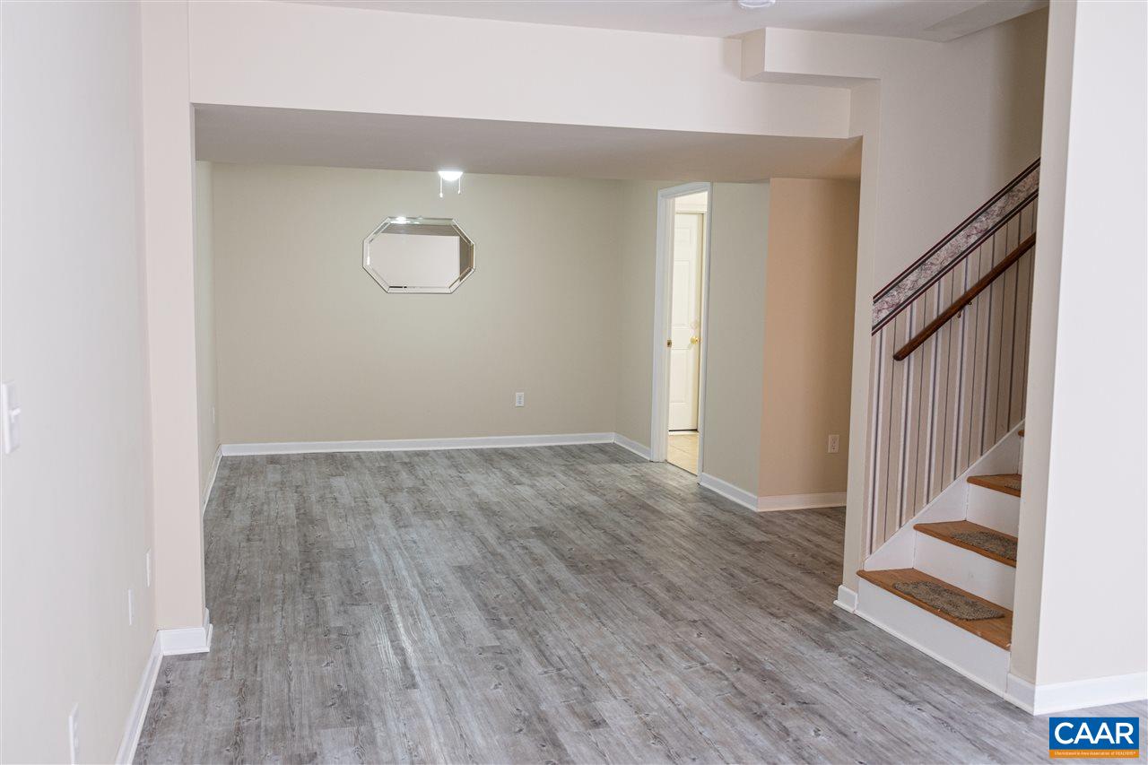 29 East Point Road Palmyra, VA 22963 - Photo 25 of 33 an empty room with wooden floor and entryway