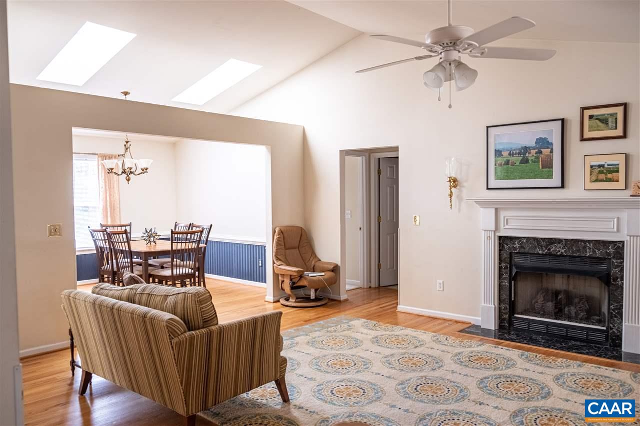 29 East Point Road Palmyra, VA 22963 - Photo 5 of 33 a living room with furniture and a fireplace