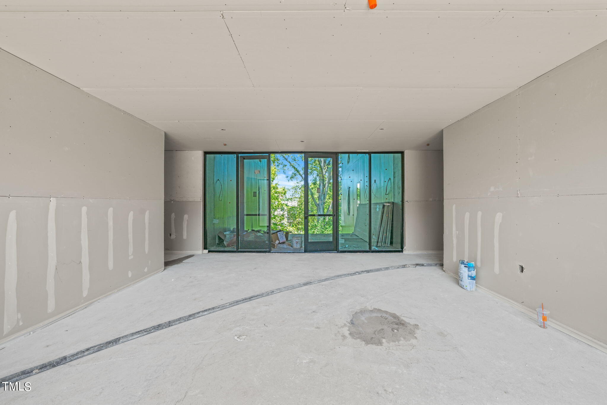 29 Enterprise Street, Unit 311 Raleigh, NC 27607 - Photo 20 of 33 a view of an empty room with a window