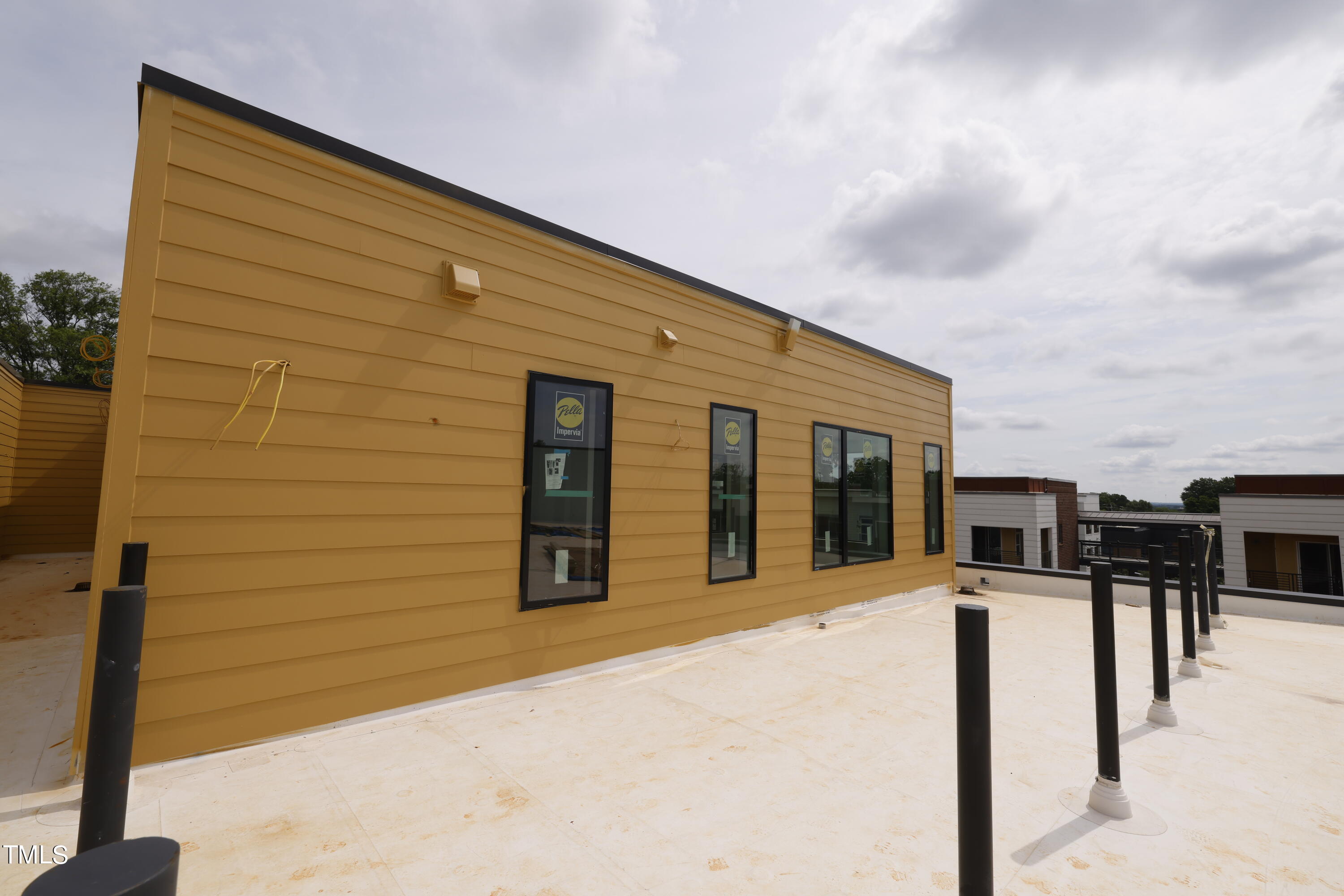 29 Enterprise Street, Unit 311 Raleigh, NC 27607 - Photo 25 of 33 a front view of a building with glass windows