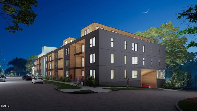 a front view of a building with a street