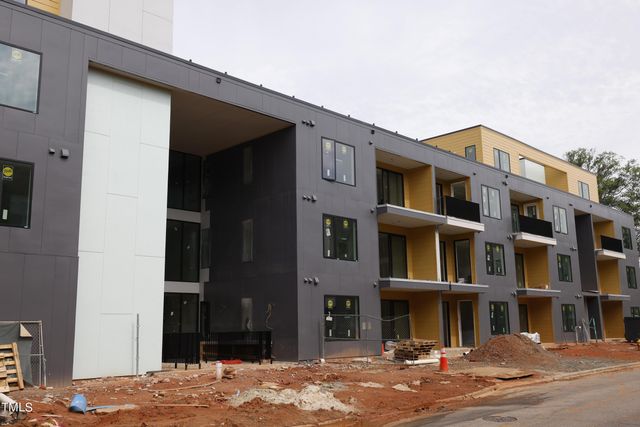 a view of building with lot of windows