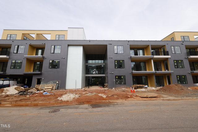 aerial view of a house with a yard