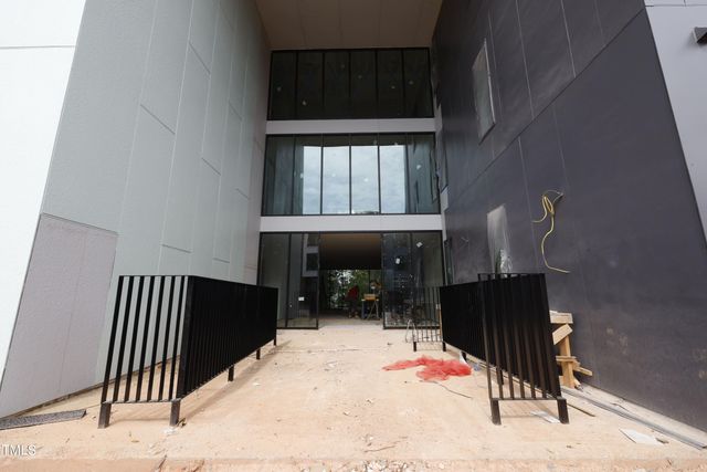 an entryway of a house with wooden floor