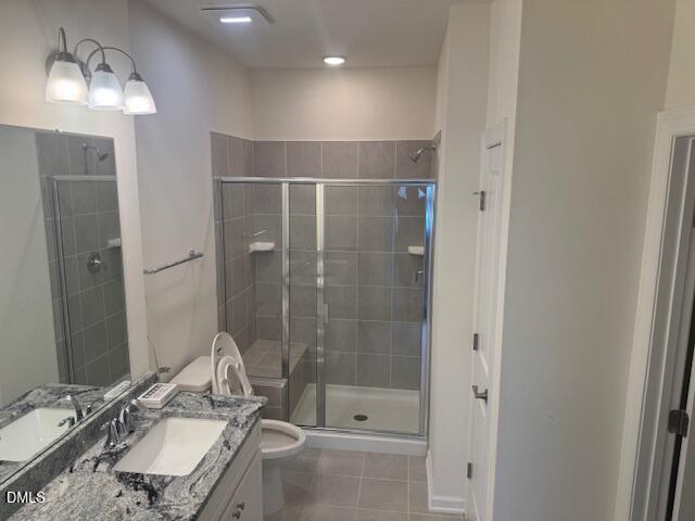 1010 Morrison Drive Durham, NC 27703 - Photo 16 of 29 a bathroom with a granite countertop sink mirror and shower