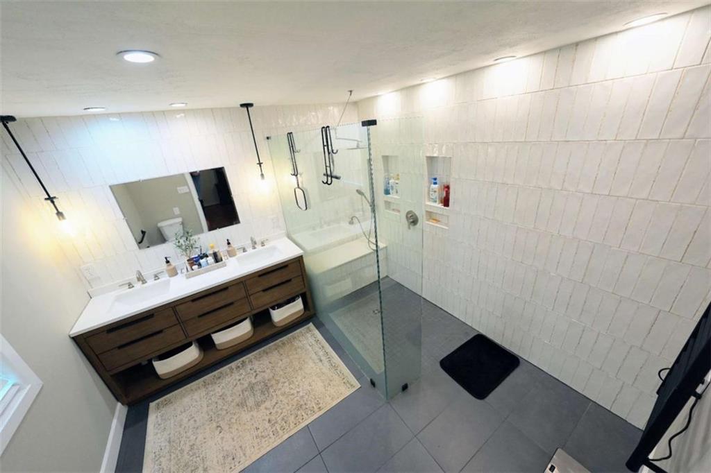 7908 Lambert Road Winston, GA 30187 - Photo 15 of 30 a living room with furniture and a flat screen tv