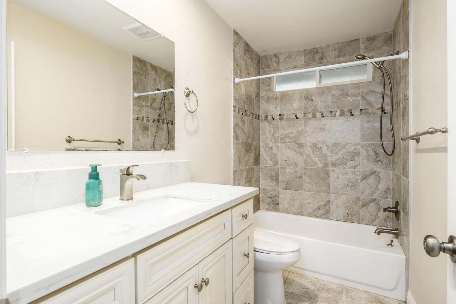 2873 Anderson Way Placerville, CA 95667 - Photo 17 of 24 a bathroom with a sink a toilet and shower