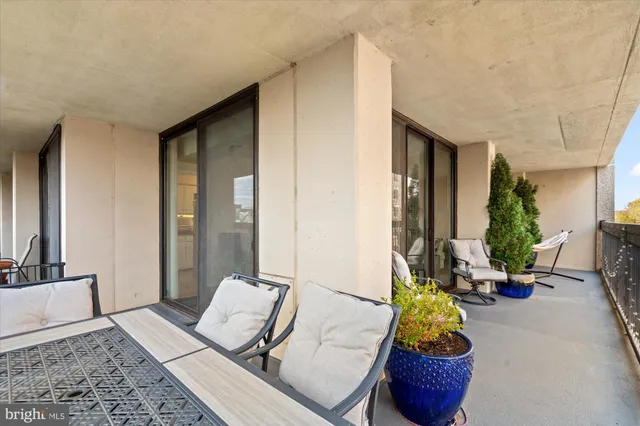 a view of balcony with furniture