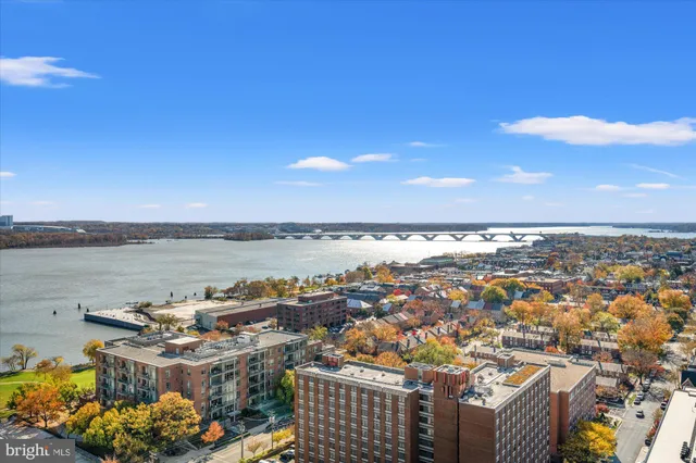 a view of a lobby with furniture and a potted plant