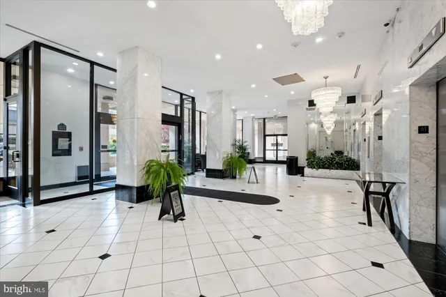 a view of a dining room with furniture and window