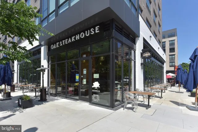 a view of street with sitting area