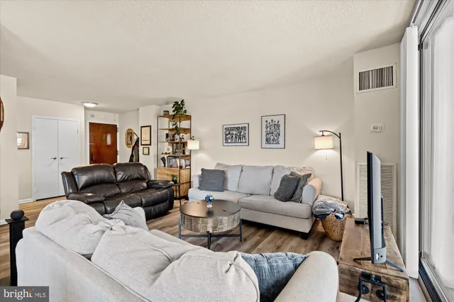 a living room with furniture and a couch
