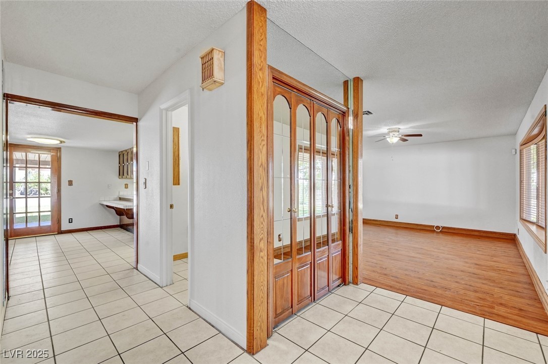 8970 West Lone Mountain Road Las Vegas, NV 89149 - Photo 21 of 94 Entry at the front door, living room to the right