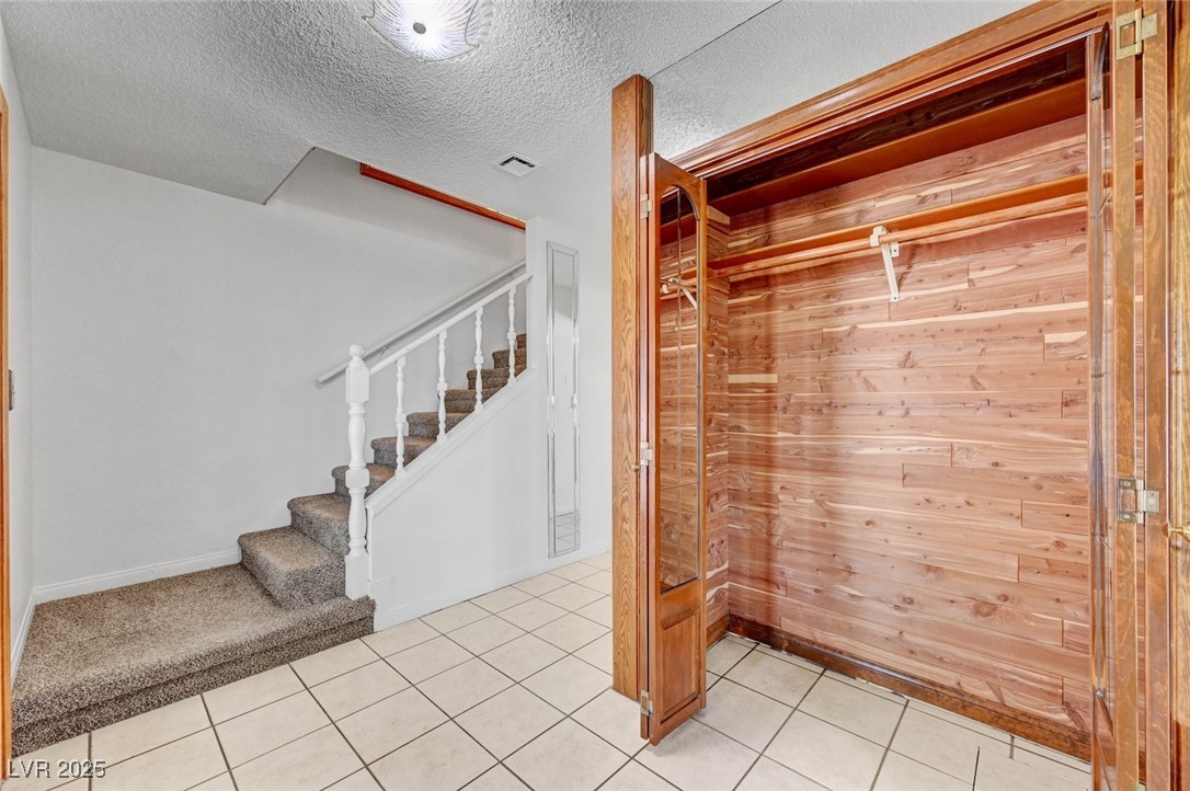 8970 West Lone Mountain Road Las Vegas, NV 89149 - Photo 24 of 94 coat closet at the front door entry