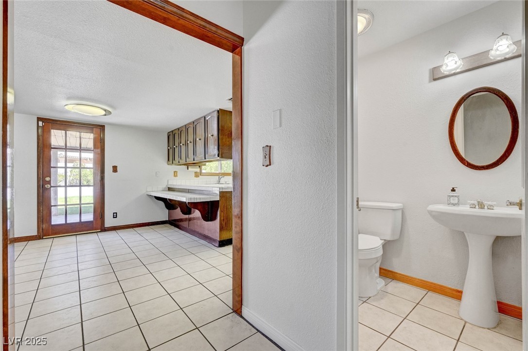 8970 West Lone Mountain Road Las Vegas, NV 89149 - Photo 25 of 94 hall bath off the living room area