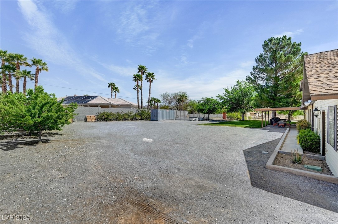 8970 West Lone Mountain Road Las Vegas, NV 89149 - Photo 66 of 94 Backyard, All pods are rentals and will not stay. There is a small shed with electric in the back corner that does convey.