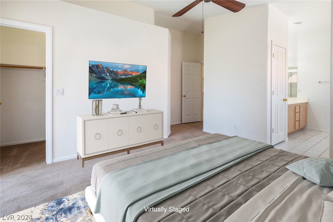2357 Ramsgate Drive Henderson, NV 89074 - Photo 11 of 38 Spacious primary bedroom with patio access and ens