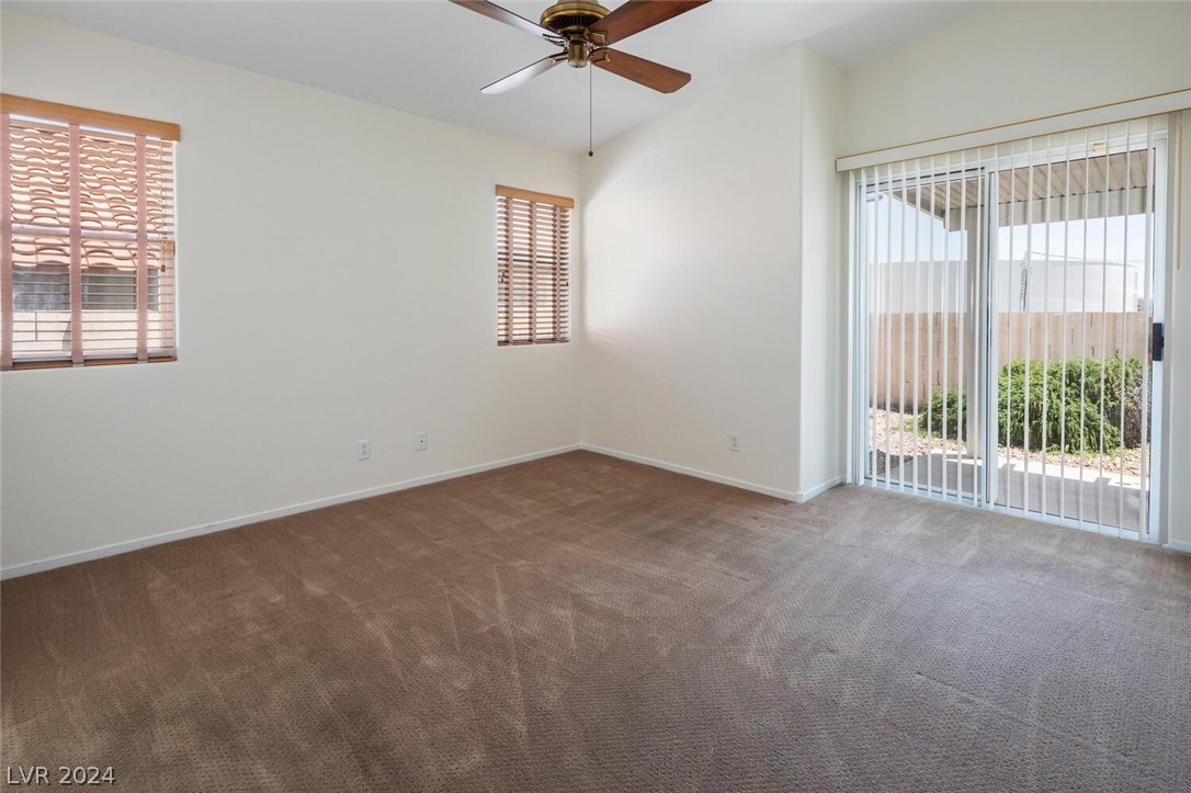2357 Ramsgate Drive Henderson, NV 89074 - Photo 23 of 38 Spacious primary bedroom with patio access and ens