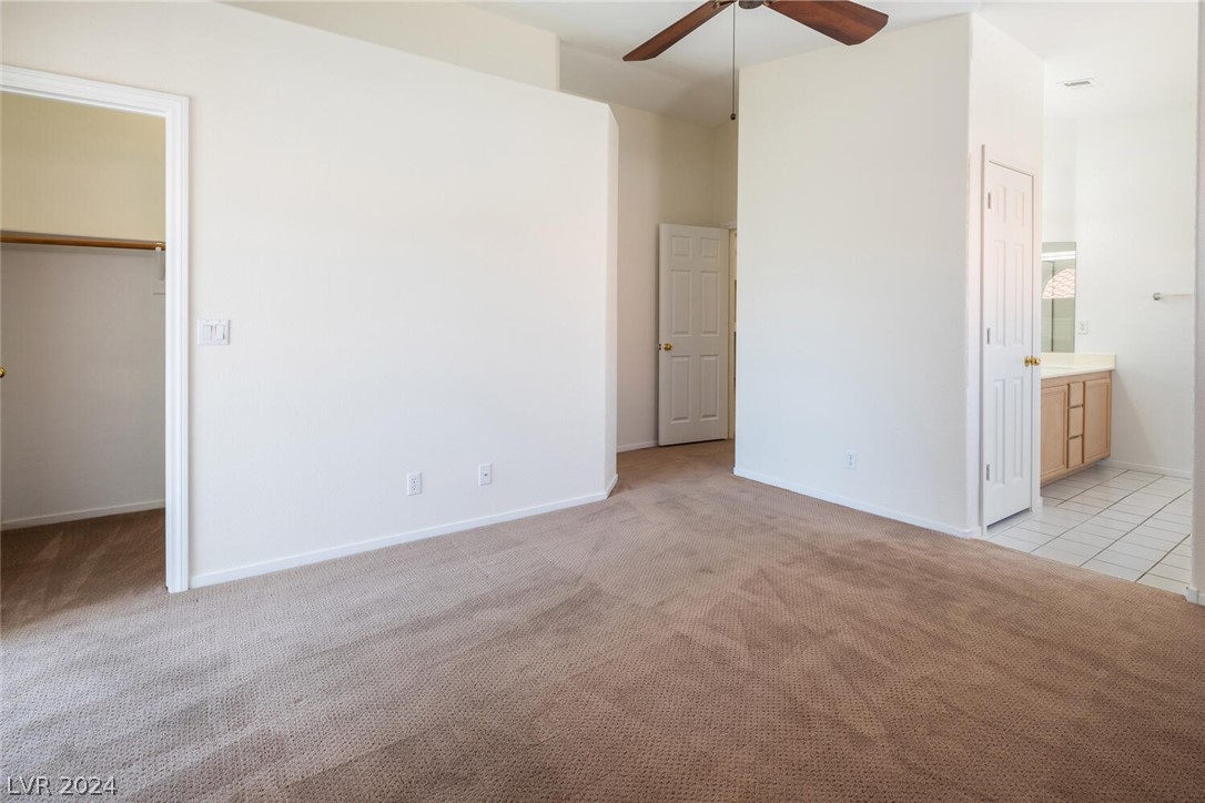2357 Ramsgate Drive Henderson, NV 89074 - Photo 24 of 38 Spacious primary bedroom with patio access and ens