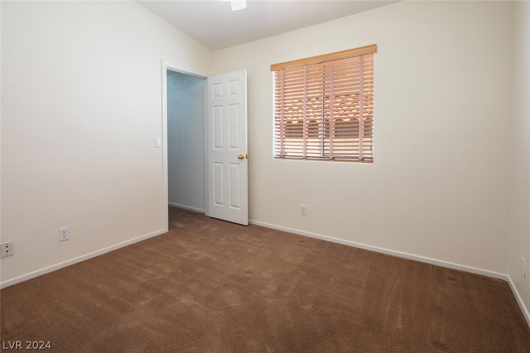 2357 Ramsgate Drive Henderson, NV 89074 - Photo 30 of 38 Comfortable guest bedroom with walk-in closet.