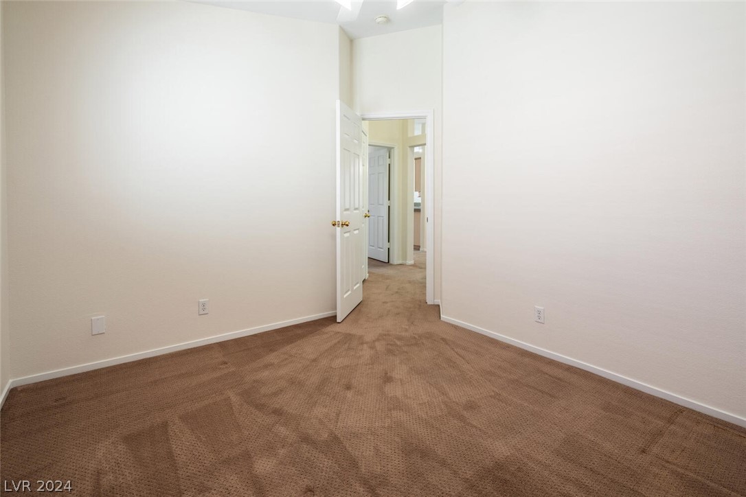 2357 Ramsgate Drive Henderson, NV 89074 - Photo 31 of 38 Comfortable guest bedroom with walk-in closet.