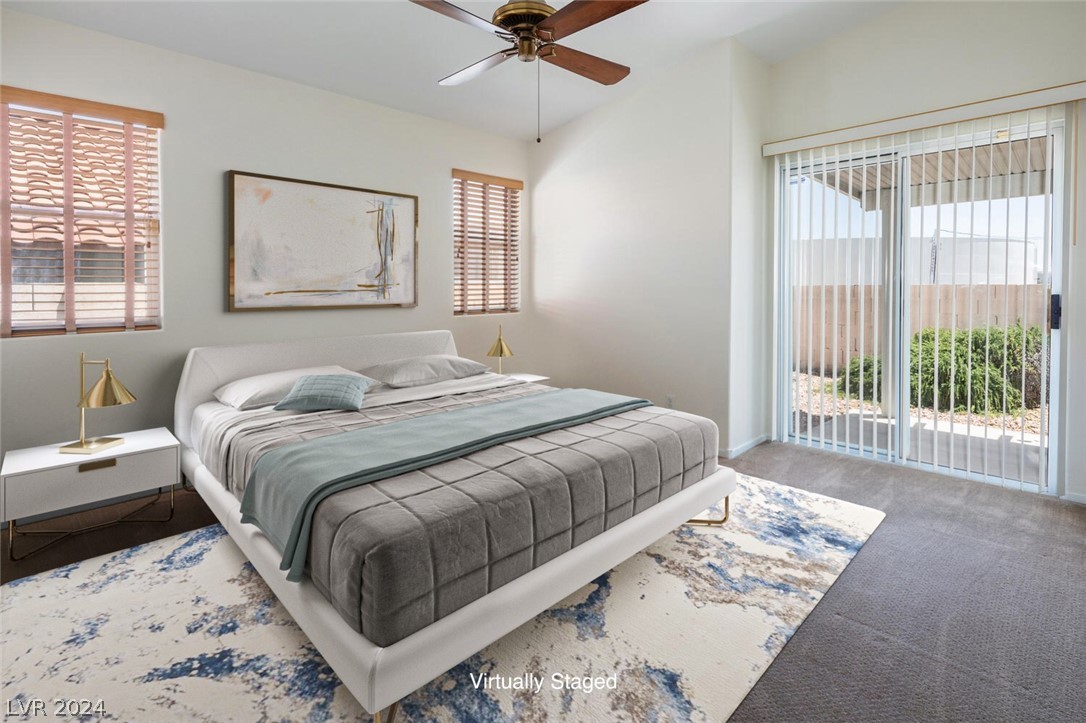 2357 Ramsgate Drive Henderson, NV 89074 - Photo 10 of 38 Spacious primary bedroom with patio access and ens