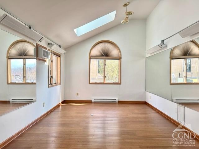 75 Bridge Street Catskill, NY 12414 - Photo 6 of 17 a view of empty room with wooden floor and fan