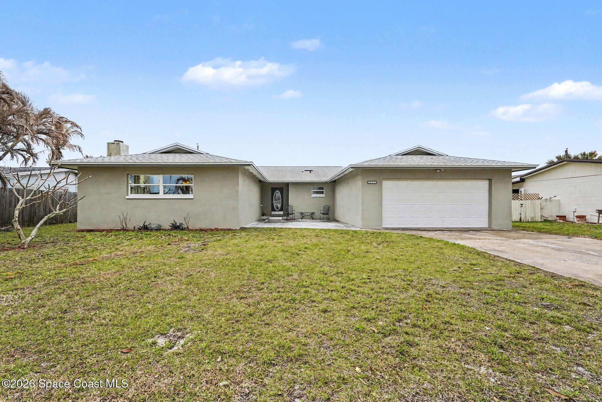 455 Riverside Avenue Merritt Island, FL 32953 - Photo 1 of 28 a view of a house with a backyard