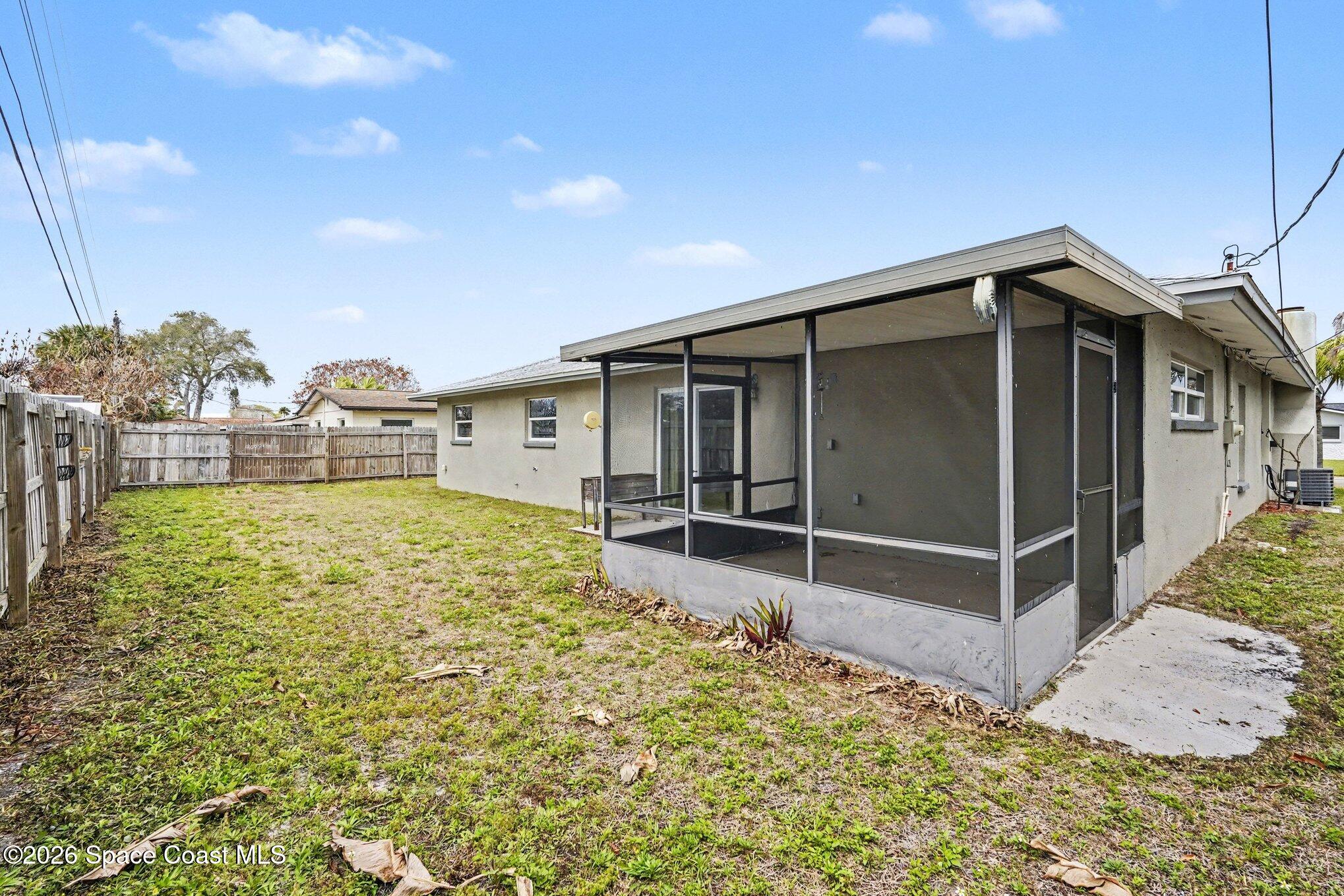 455 Riverside Avenue Merritt Island, FL 32953 - Photo 24 of 28 a backyard of a house